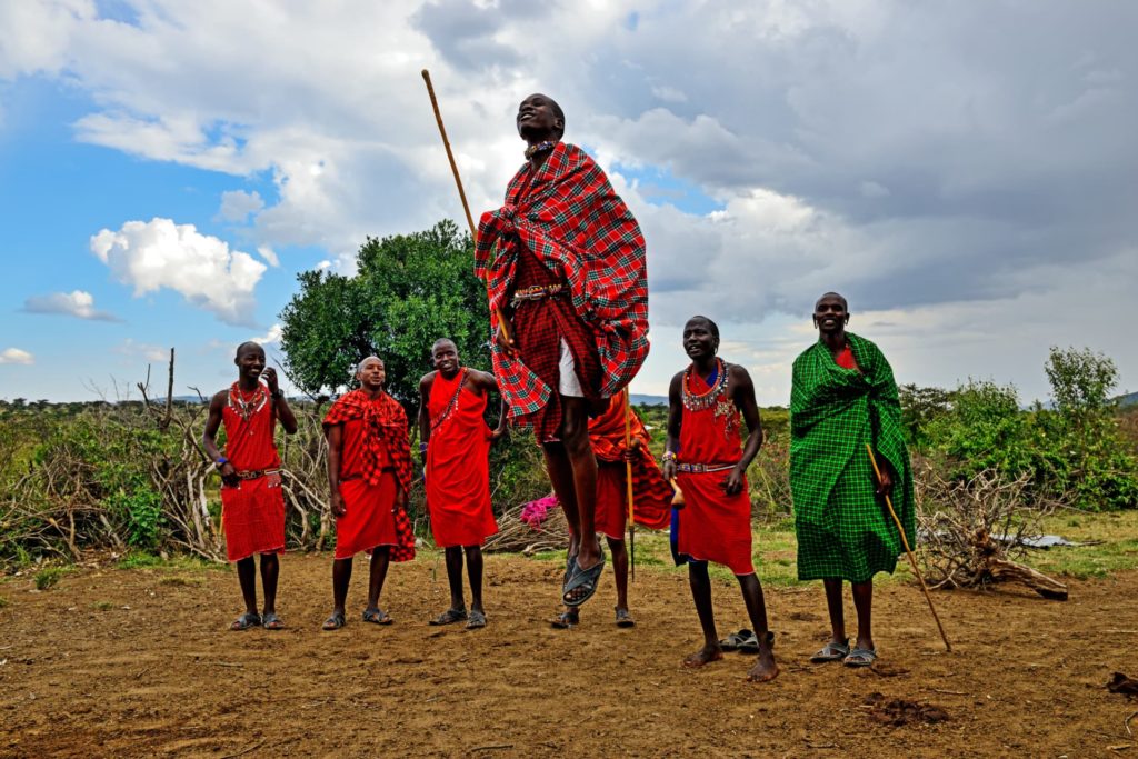Maasai men doing traditional dance in Serengeti