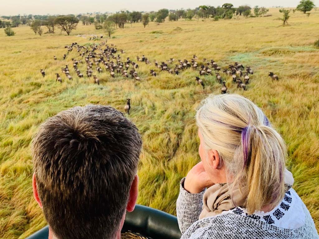 Unforgettable experience of tranquility and beauty on hot air balloon safaris over Tanzania's wild plains.